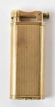 DUNHILL; a 9ct yellow gold cigarette lighter, height 6cm, width 2.5cm, approx 37.5g.