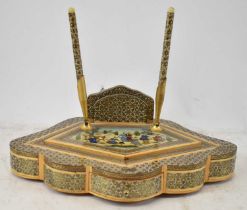 A Persian inlaid desk stand with single drawer to base and twin pens in moveable apertures, width