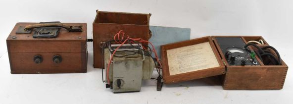A cased vintage Evershed Testing Set, a cased Clark Instrument Co Loop Tester V133, and a leather
