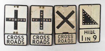 A group of four railway signs comprising 'Hill 1 in 9', and three 'Cross Roads' signs, each measures