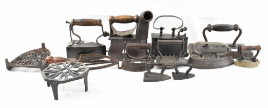A group of 19th century and later cast irons, including a Nauhoffnungs-19-Hutte-17 iron, two irons