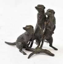An early 20th century limited edition bronze figure of three meerkats, indistinctly signed to base