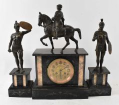 A late 19th century slate mantel clock with spelter model of a warrior on horseback, with pair of