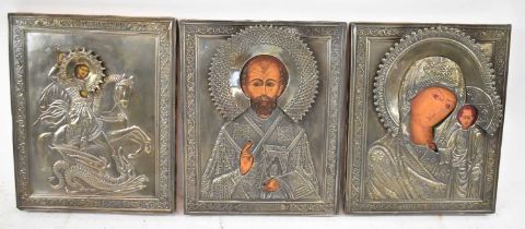 Three Russian icons, St George The Great, St Nicholas and our Lady of Kazan, each approx 22 x 17.