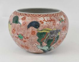 A late 19th century Chinese Wucai porcelain jardinière decorated to the exterior with four