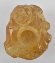 A 20th century Chinese agate water pot carved with a three legged toad, width 6.5cm.