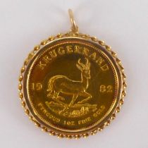 A 1982 Krugerrand, 1oz fine gold, in 9ct gold rope twist mount with hoop, combined approx 38.4g.