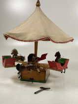 ATTRIBUTED TO JOSEPH LINES; a rare late 19th century roundabout and wagon, comprising working