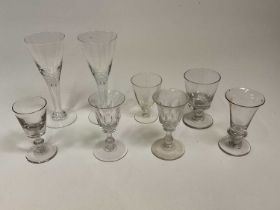 Eight various drinking glasses Condition Report: First glass has chips to foot and a flea bite to