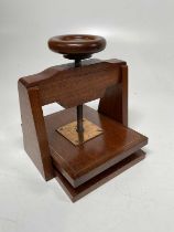 A vintage mahogany press with brass inserts, for pressing flowers, height 41cm.