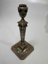 MARTIN, HALL & CO; a late Victorian hallmarked silver neoclassical inspired loaded candlestick