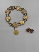 A Chinese gold bracelet and earrings, 7.4gm