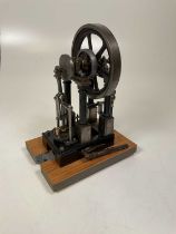 A scratch-built static engine raised on simple wooden base, height 33cm.