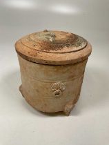 A rare Chinese Han Dynasty (206BC-220AD) pottery tri-footed vessel and cover, height 23cm. Presented