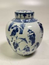 A late 19th century Chinese blue and white ginger jar and cover decorated throughout with figures
