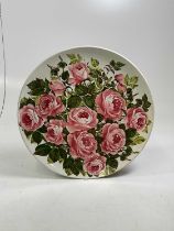 WEMYSS; a large cabbage rose decorated circular charger, impressed marks to the reverse, diameter