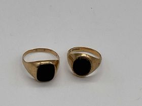 Two 9ct yellow gold and onyx set gentleman's signet rings, sizes V and 1-1/2, combined approx. 13.3g