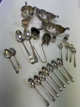 A group of mixed small silver including a pair of boat shaped small bowls, sauceboat, pair of open
