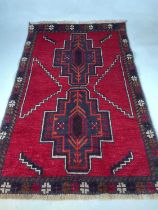 A Baluchi rug, 133 x 85cm.