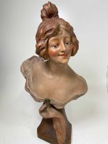 An early 20th Century Art Nouveau pottery bust of a young woman, signed C R Faggioni, height 76cm