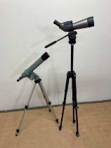 A Kenko Pro Field Deluxe 70A telescope on stand with another