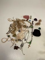 A quantity of costume jewellery and semi-precious stones including silver cufflinks, earrings,