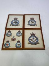 Four paintings of Air Force squadron badges, each 23 x 23cm, framed and glazed