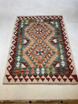 A Chobi Kilim rug, 121cm x 84cm