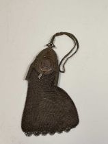 An Art Nouveau white metal mesh purse decorated with buds and an unusual smaller example with hinged