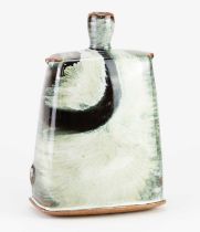 JAMES HAKE (born 1979); a rectangular stoneware bottle covered in nuka and tenmoku glaze,