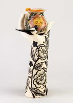 LOIS GUNN (born 1985); 'Opportunity', a bipartite stoneware sculpture of a hand holding a vase and