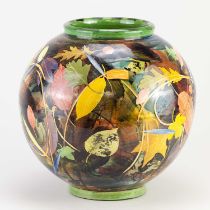 SOPHIE MACCARTHY (born 1956); a slip-painted earthenware moon jar decorated with autumn leaves,