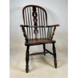 A 19th century Windsor high back arm bow chair with elm seatDimensions: H: 104cm W: 59cm