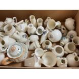 A collection of crested china, including Goss, Arcadian, and others.