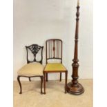 An early 20th century oak standard lamp and two side chairs.