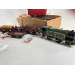 A 1930's Hornby clockwork GWR locomotive, five boxed Hornby accessories, and a quantity of track.