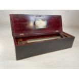 A late 19th century Swiss rosewood cased eight air musical box with 13in barrel and original card to