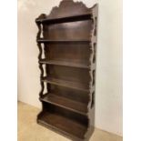 A tall dark wood six tier freestanding waterfall bookcase, height 200 cm x 94cm