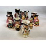 ROYAL DOULTON; three character jugs, The Huntsman, Jolly Toby, and Leprechaun D6948, also seven