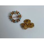 A 15ct yellow gold pearl and turquoise floral brooch, diameter 25mm, and a yellow metal gem set