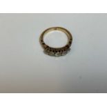 An 18ct yellow gold and graduated five stone diamond ring set with old cut stones, size M, approx.