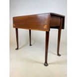 A mahogany drop leaf-table with inlay detail. 68cmh x 84cm w x 80cm