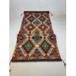 A Chobi Kilim runner, 158 x 65cm.