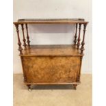 A Victorian burr and figured walnut Canterbury whatnot with three ported brass gallery above lower