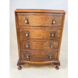 A miniature chest of drawers 69cm h x 48cm w x 37cm d