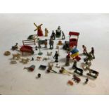 A small group of mid 20th century painted lead figures.