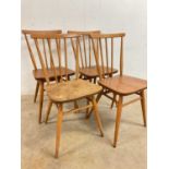 A set of four Ercol stick back kitchen chairs, without mark or label, seat height 45cmQty: 4