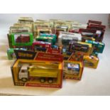 A large collection of boxed collectors' cars includes Matchbox Models of Yesteryear, Rio, a boxed