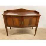 A small two door bowfronted sideboard with shaped gallery, height 89cm, width 107cm, depth 56cm.