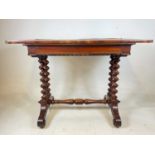 A late Victorian walnut single drawer side table raised on barley twist supports, width 100cm.